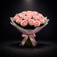 Bouquet of pink roses wrapped in white paper with a pink ribbon on a black background